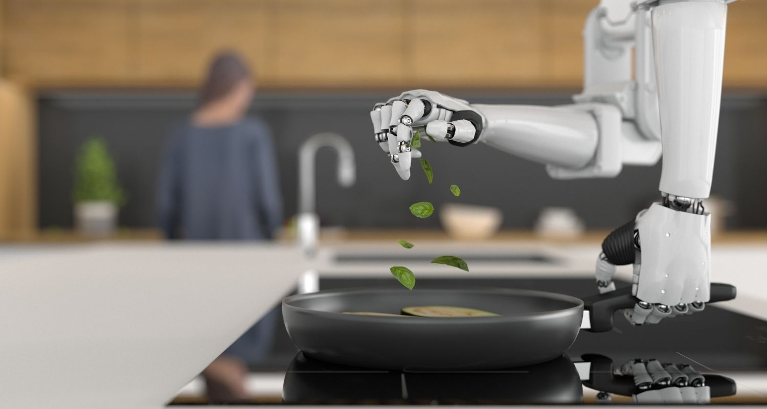 A robot seasoning a dish with fresh herbs