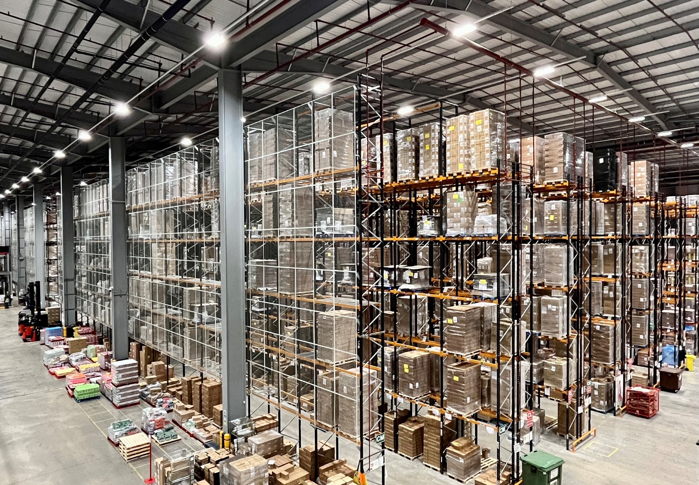 Warehouse with packages placed on high racks